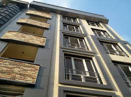 تحقیق و پژوهش نمای سنگی، شیشه ای و رنگی در ساختمان